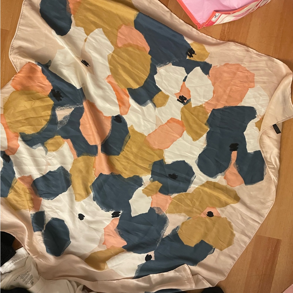 Abstract floral print scarf with blue, peach, and white brushstroke shapes